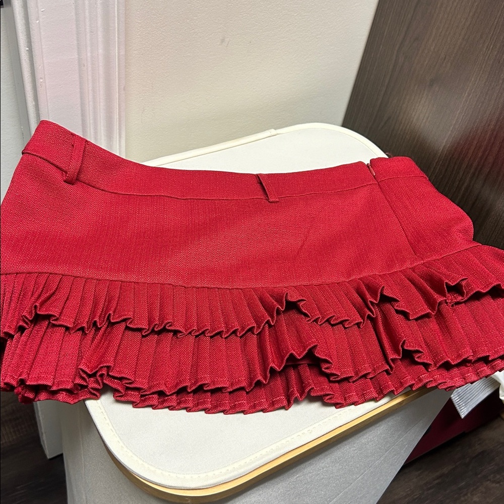 Lioness brand— Red Pleated Mini Skirt
Never worn- no tags but brand new